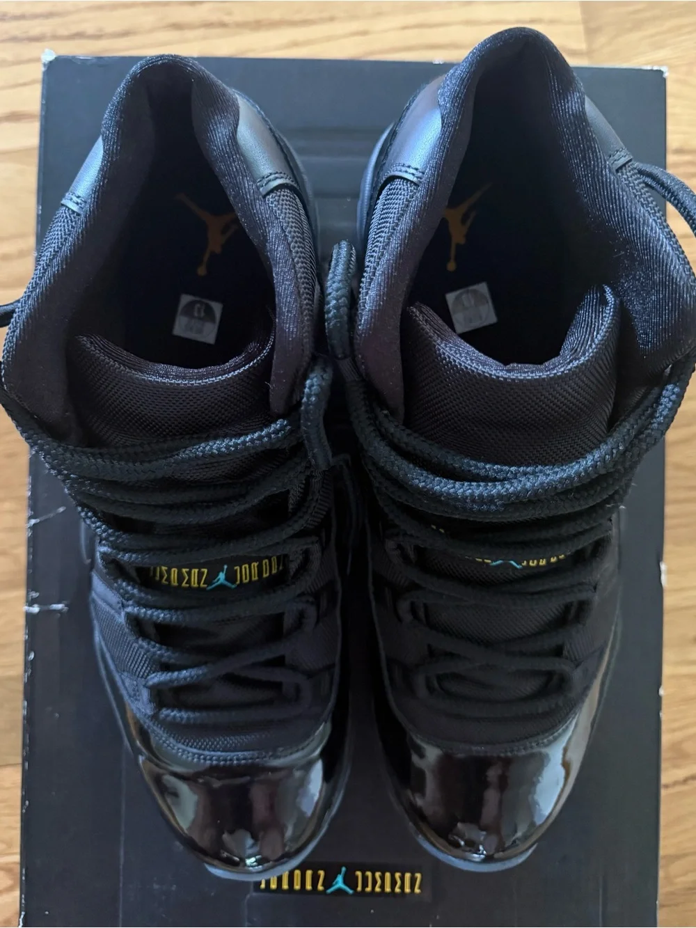 Jordan Retro 11 Athletic Shoes - Black with Teal Accents